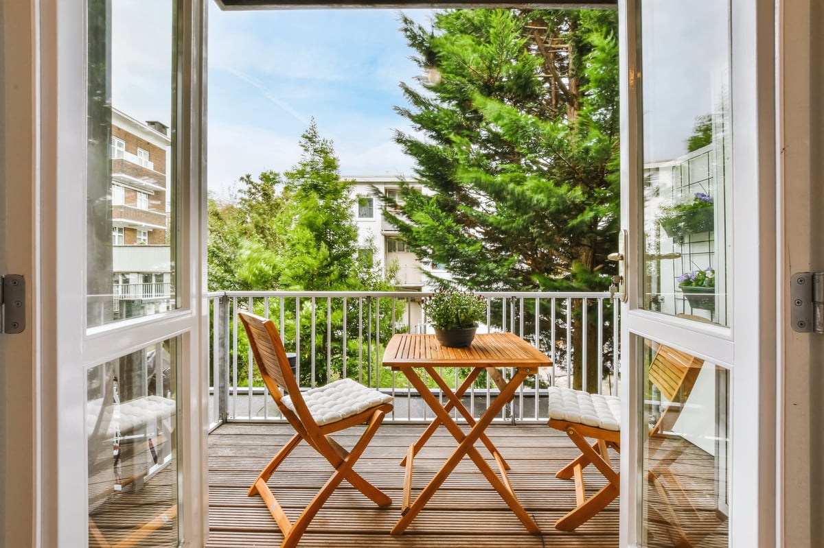 Berlin Gardens bistro set — poly lumber café table and chairs for Pensacola balconies and lanais