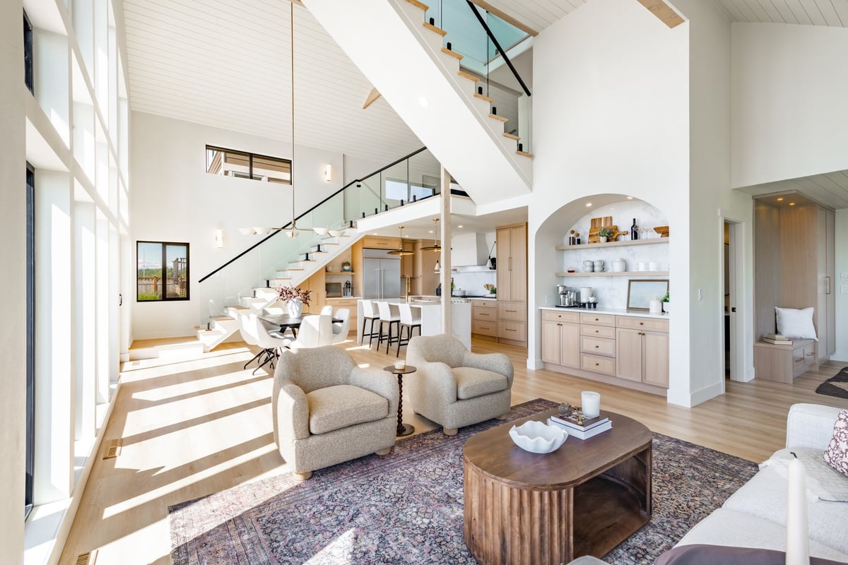 Luxury whole home remodeling Pensacola - elegant modern interior with open concept kitchen and living area