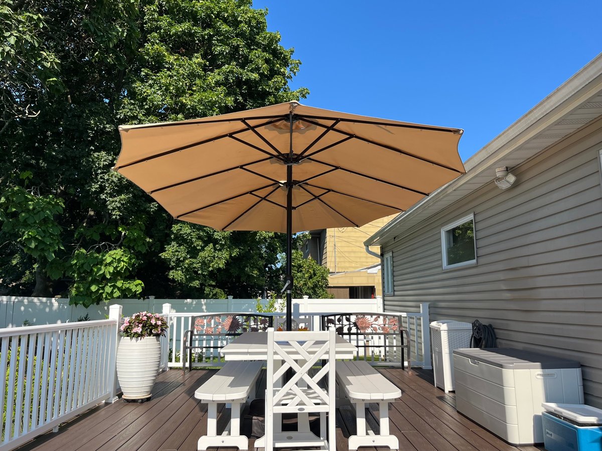 Berlin Gardens patio umbrella — fade-resistant cantilever shade for Pensacola outdoor dining sets